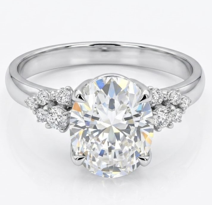 Oval Cut Cluster Accented Engagement Ring