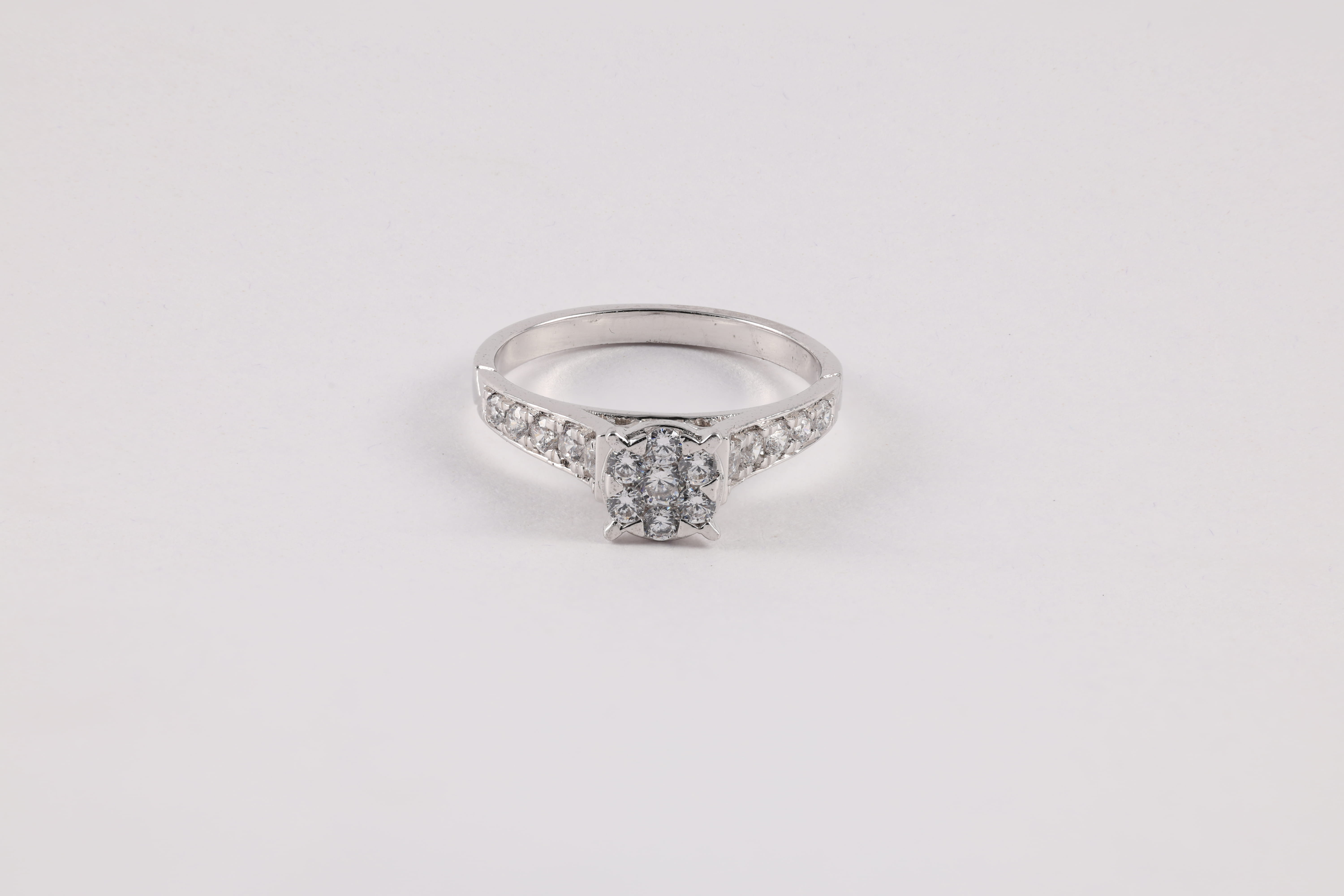 White Gold Diamond Cluster Ring with Pavé Shoulders