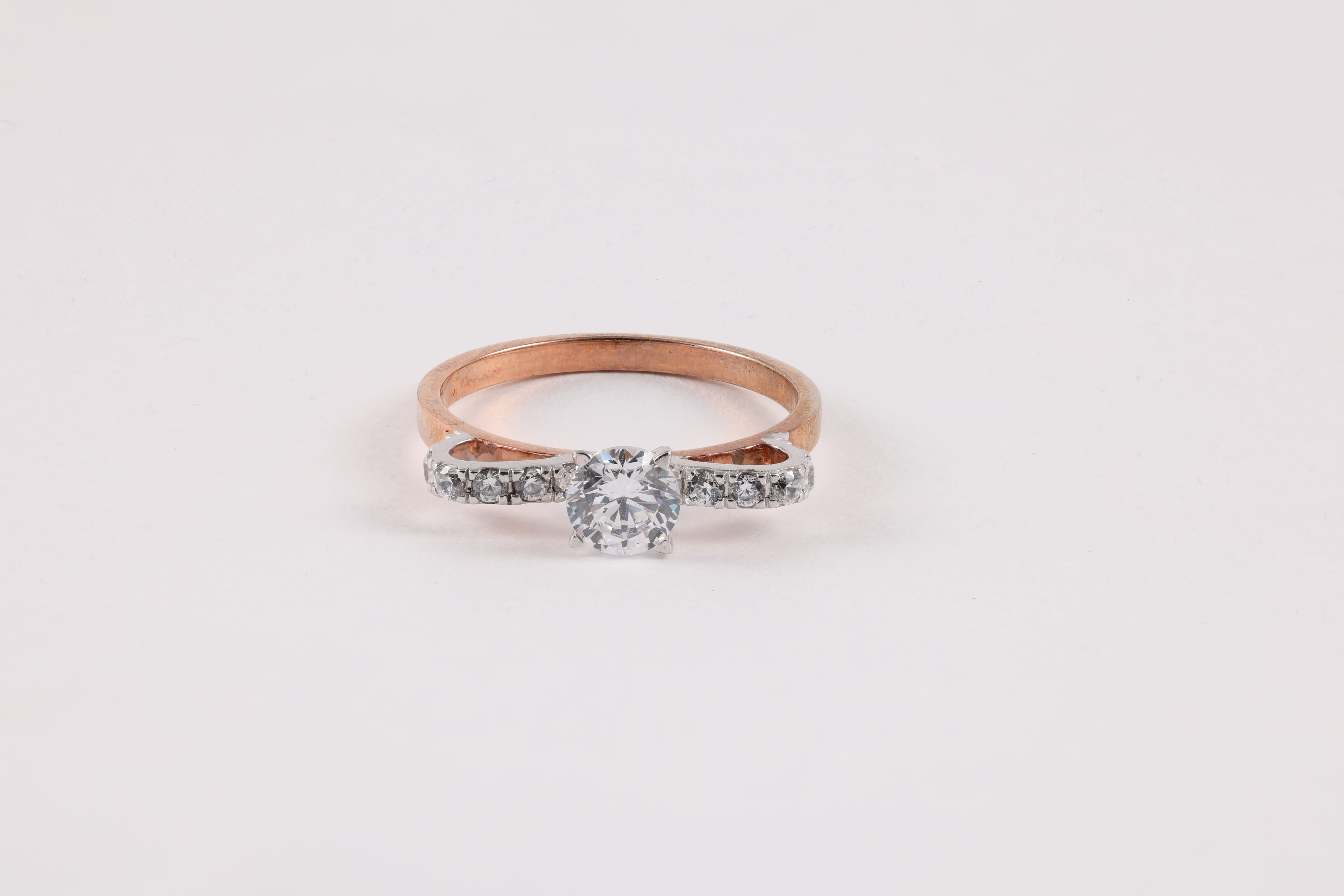 Rose Gold Diamond Solitaire Ring with Pavé Shoulders