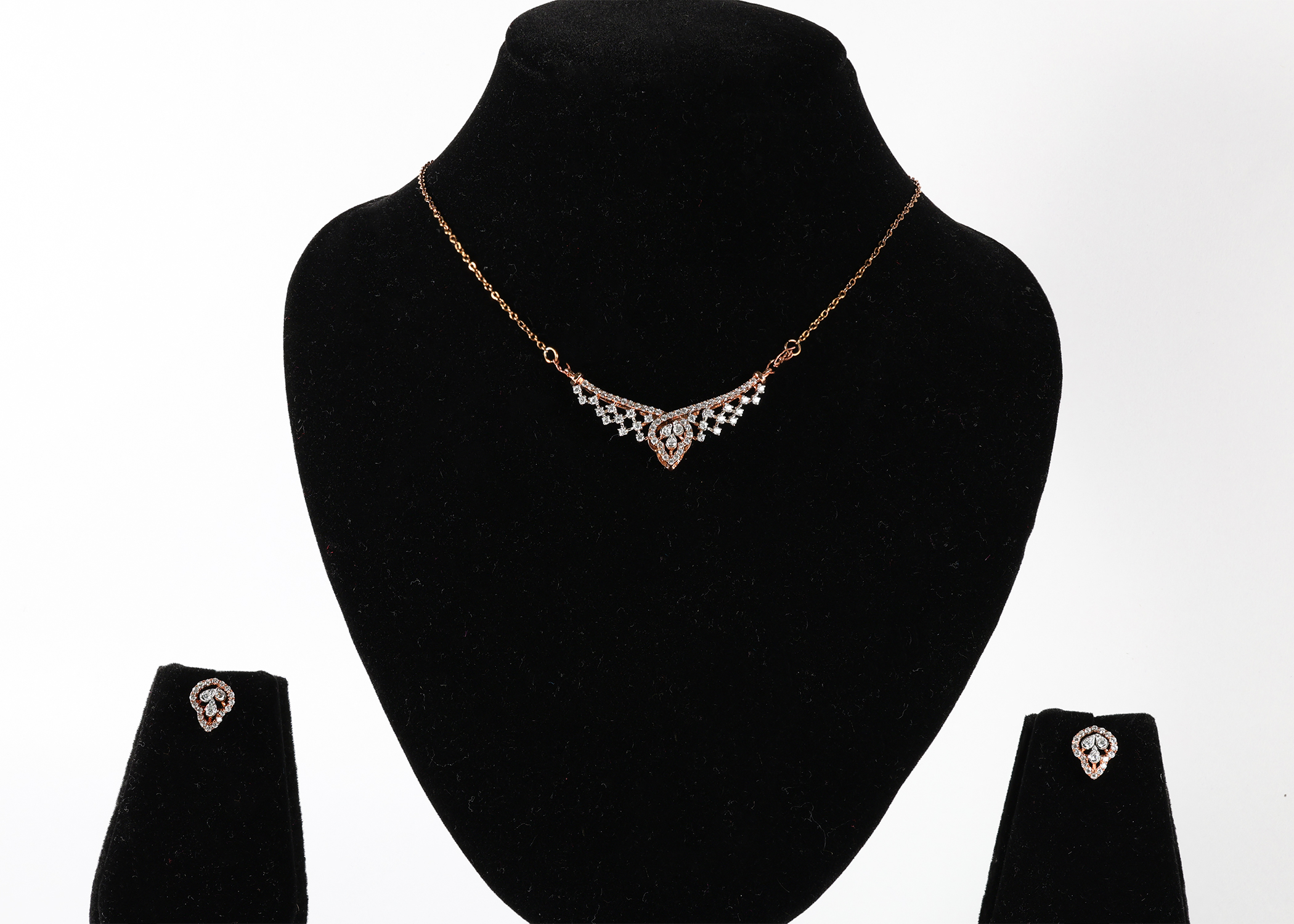Elegant real Gold diamond mangalsutra set with matching earrings.